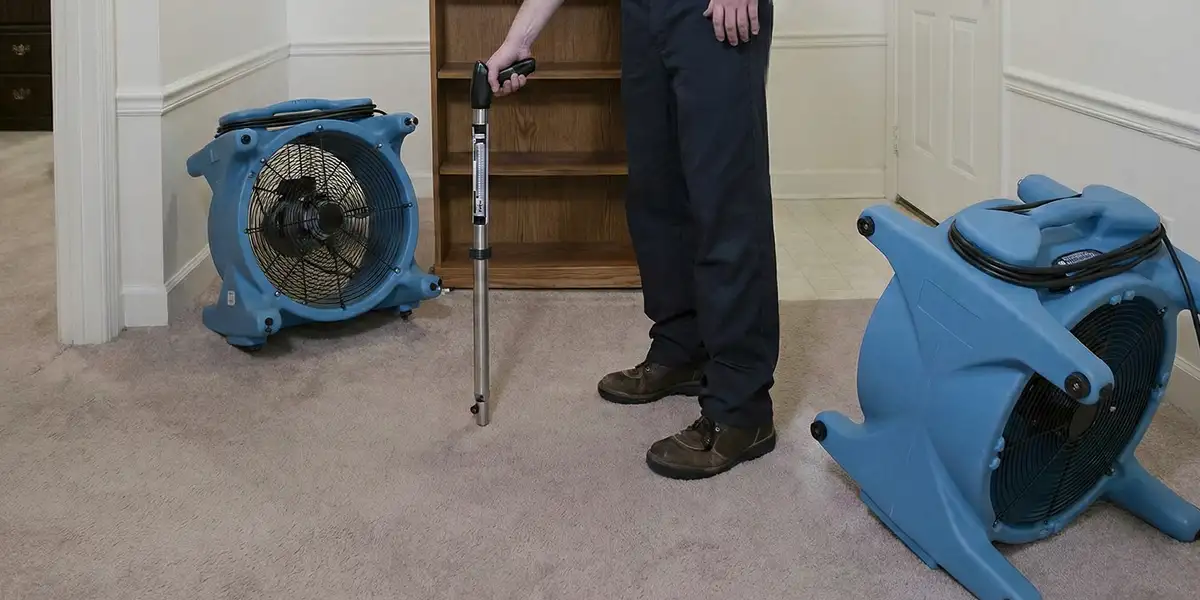 emergency water removal equipment deployed to dry a flooded residential interior in St Paul, MN